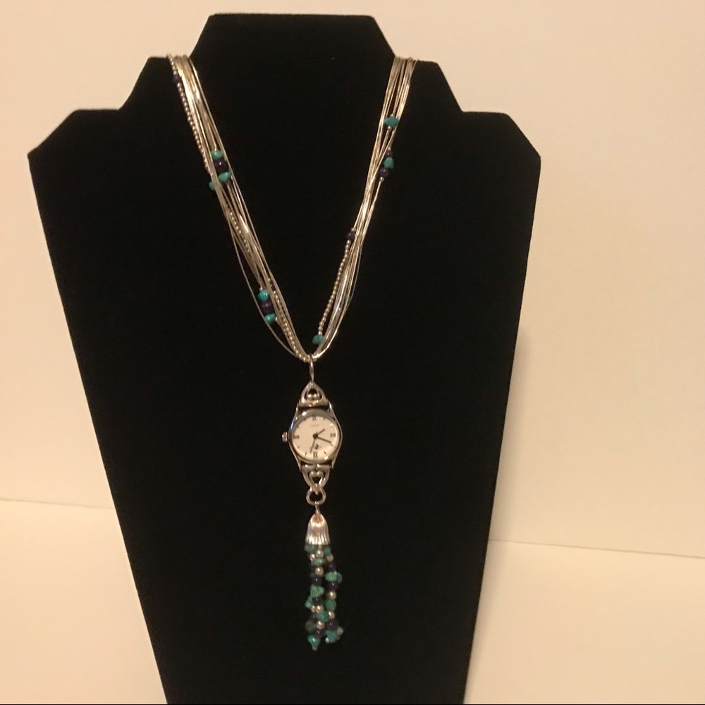 Watch necklace.